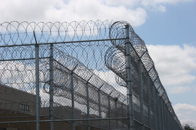 AFC Iowa City - High Security Fencing, 2102 Correctional fence with Concertina wire